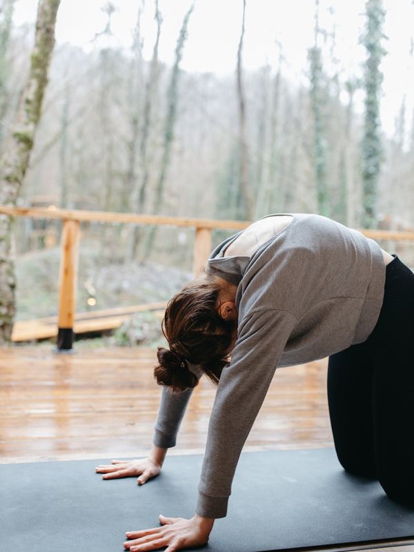 People of various ages practicing gentle yoga.